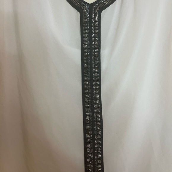 Day trip top. White with black detail.  Open back. Size large - Picture 2 of 5